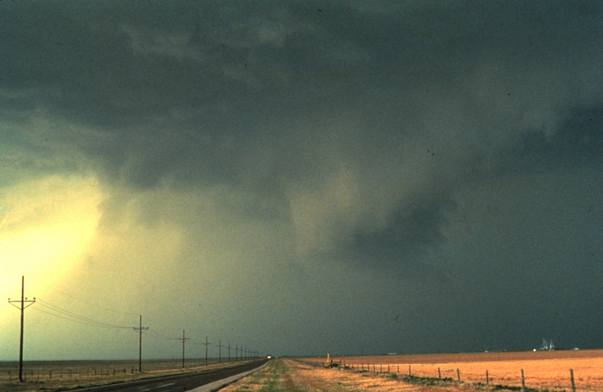 Shelf cloud and wind-driven rain beneath a thunderstorm, photographed by NOAA
