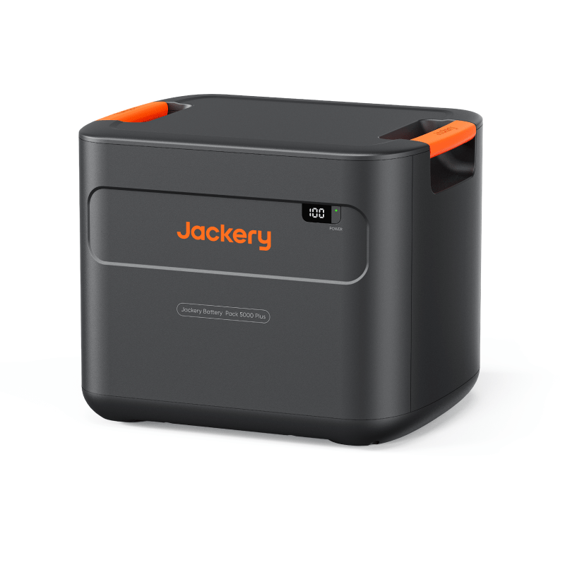 Jackery Battery Pack 5000 Plus: dark gray portable power station with orange handles and digital display.