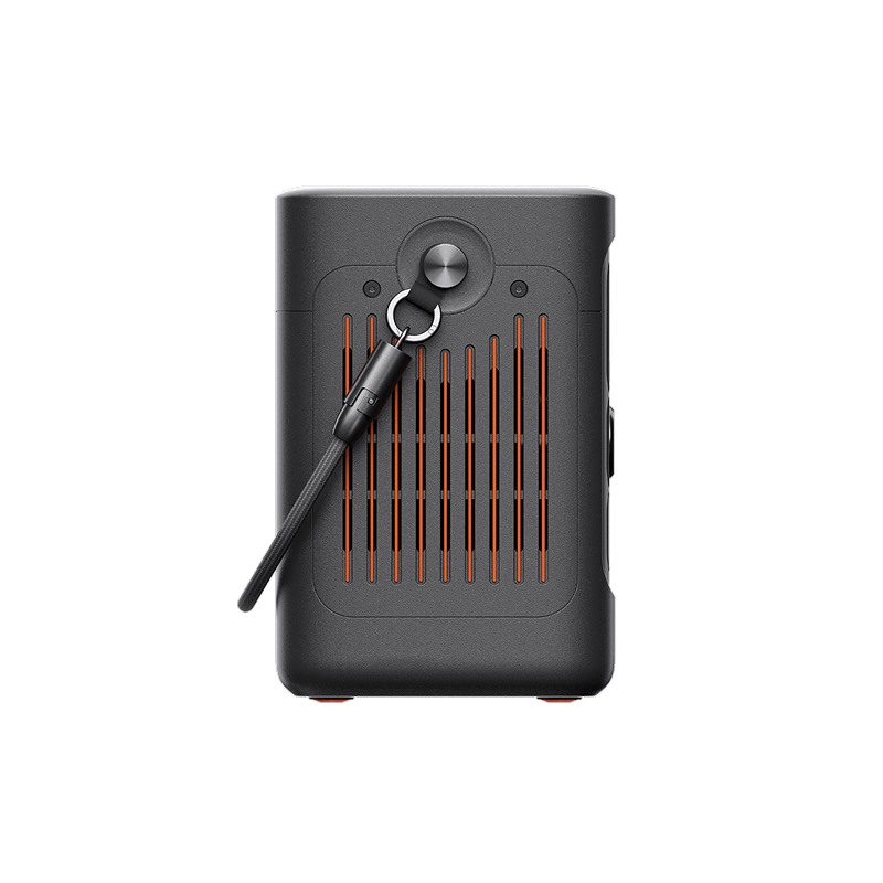 Jackery Explorer 300D portable power station, dark gray with orange vents and a black USB-C strap handle.