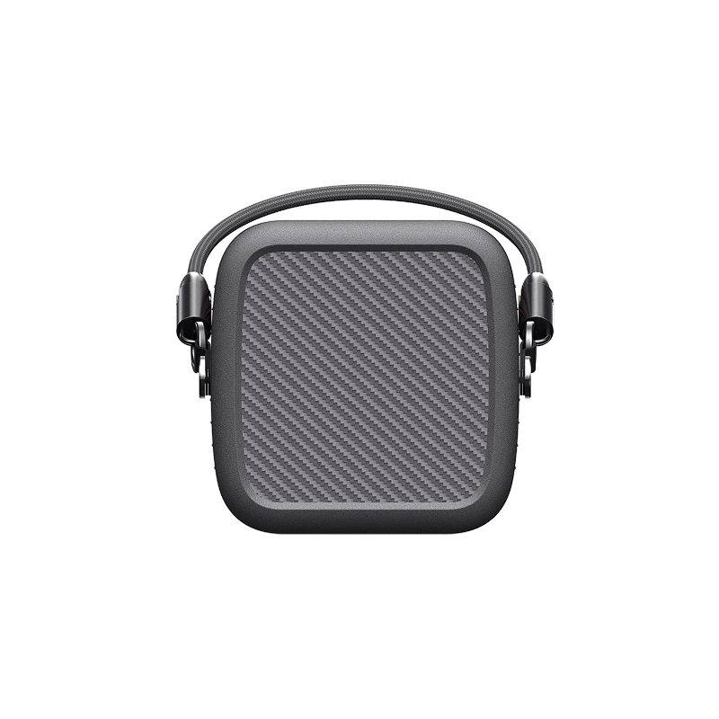 Jackery Explorer 300D portable power station with a dark gray carbon fiber-textured top and integrated USB-C strap handle.