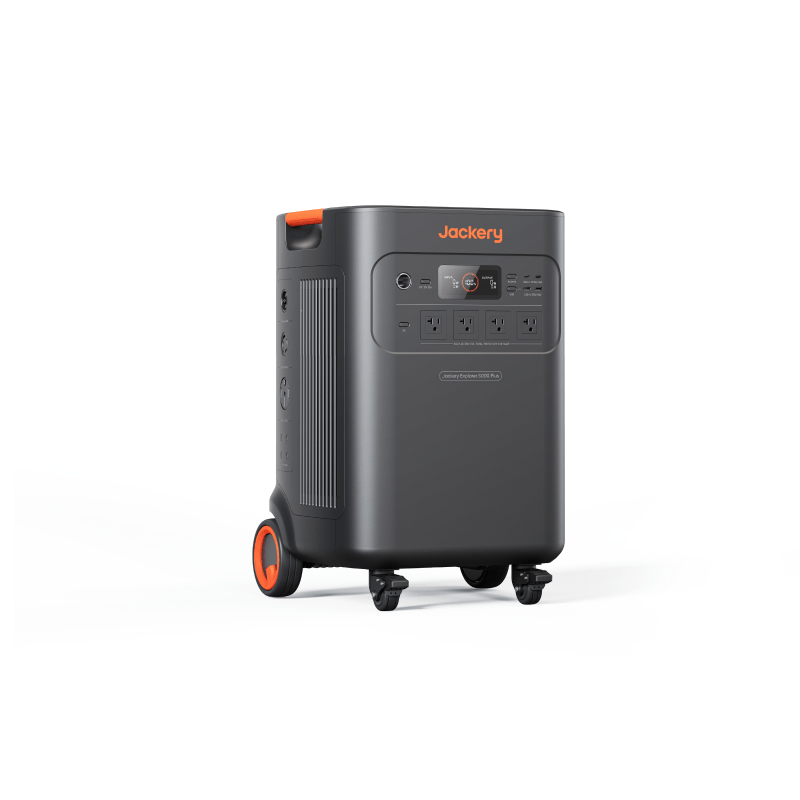 Jackery Explorer 5000 Plus portable power station, dark gray with orange accents and wheels.