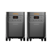 Two dark gray Jackery Explorer 5000 Plus portable power stations with orange accents and wheels.