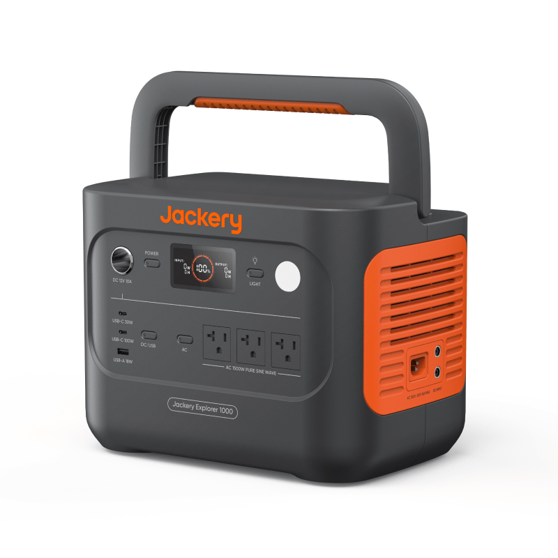 Jackery Explorer 1000 v2 portable power station, dark gray with orange accents, display, and multiple ports.