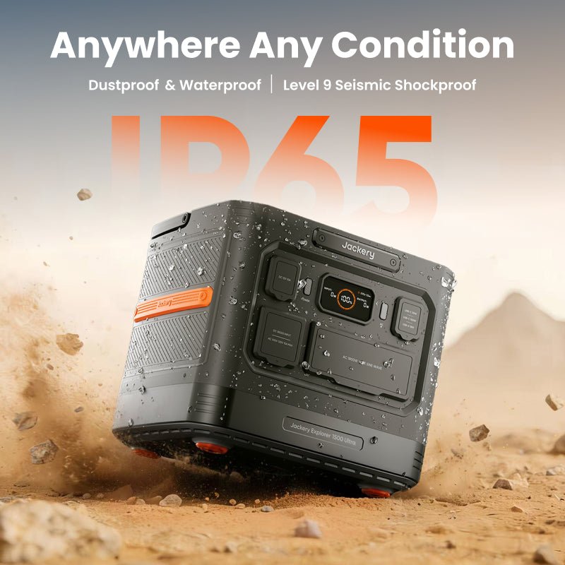 Jackery Explorer 1500 Ultra portable power station, black with orange accents, in a dusty, rocky outdoor setting.