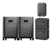 Jackery Whole-Home Backup Kit 5000 Plus with two gray portable power stations, two stacked battery packs, and a smart transfer switch.