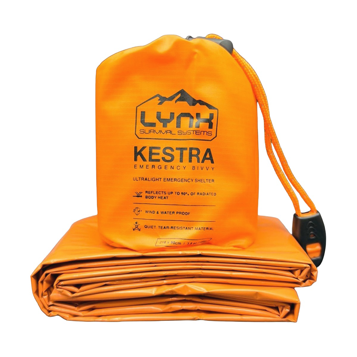 Orange KESTRA storage sack standing on the folded orange emergency bivvy, with cord and whistle, on white.