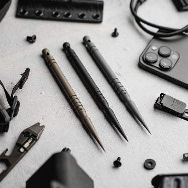 Three MarlinSpike 2.0 maritime rope tools in grey, black, and brown 4140 chromoly steel.