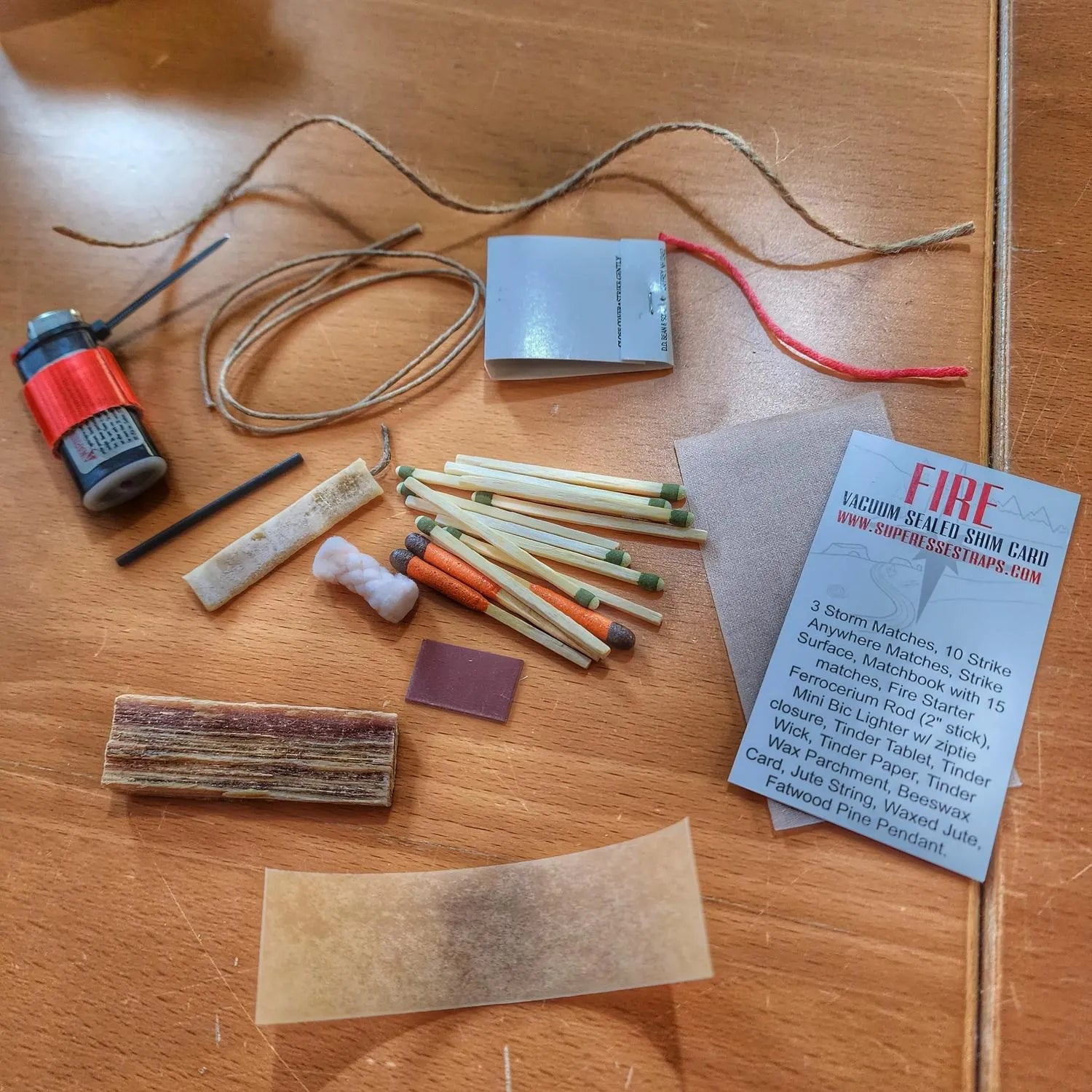 Survival Kit Lighter - Fire Starter outfitted with supplies.