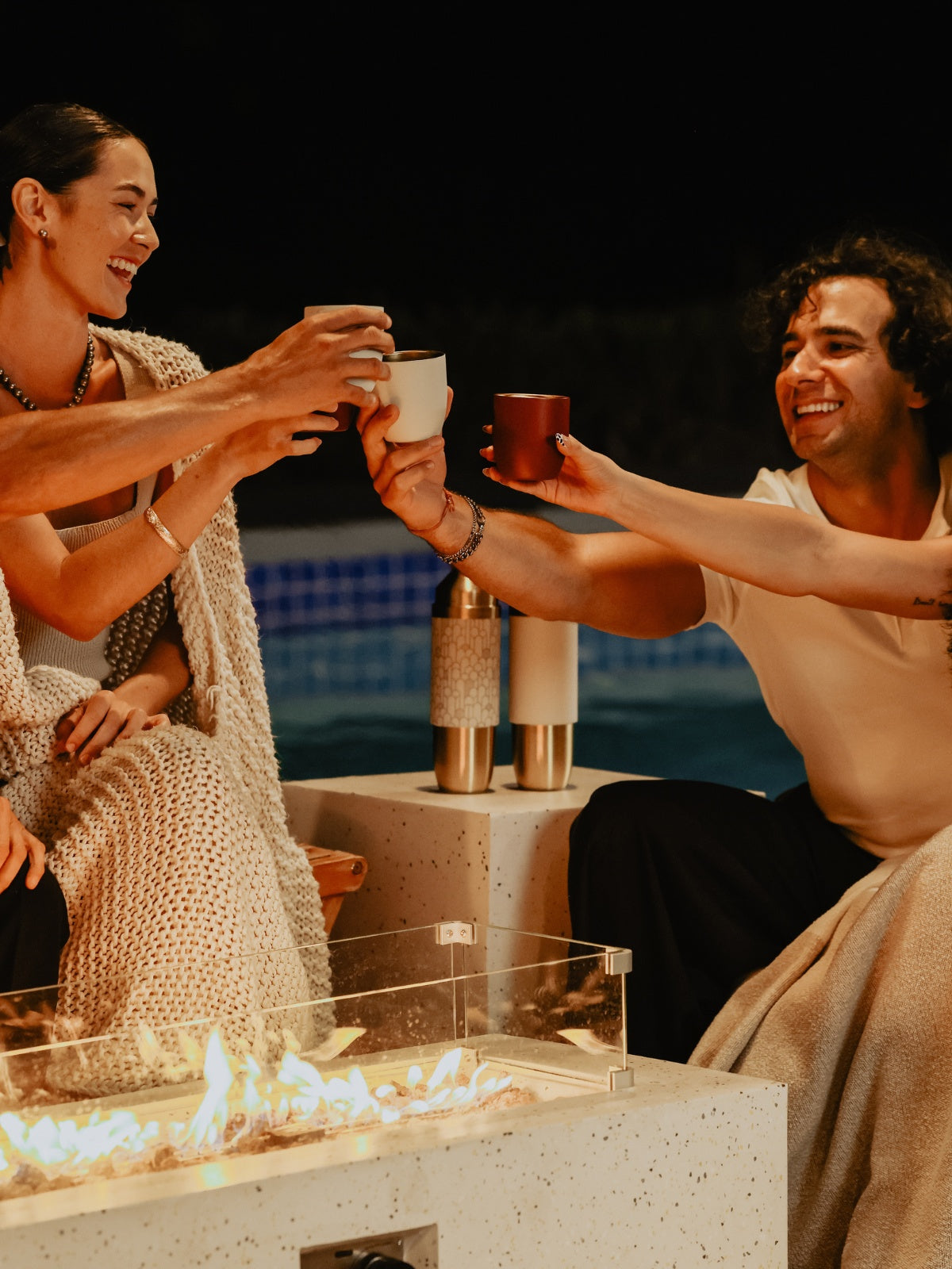 Rosso and Créma High Camp Parkside Sundown tumblers by a fire pit
