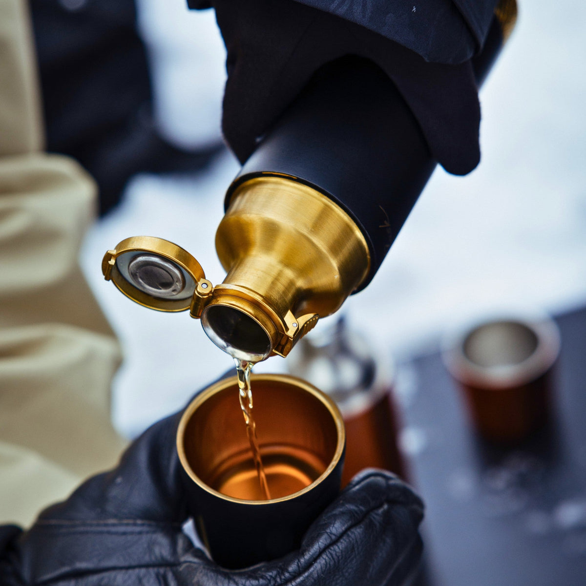 Onyx High Camp Torch Flask with flip lid in use